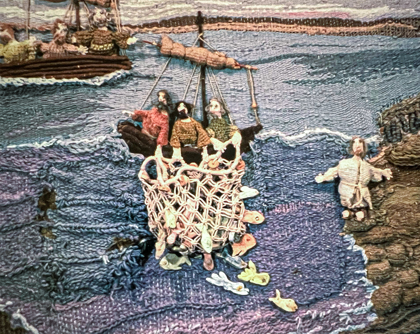 Fiber art depicting Jesus calling the disciples from a fishing boat.