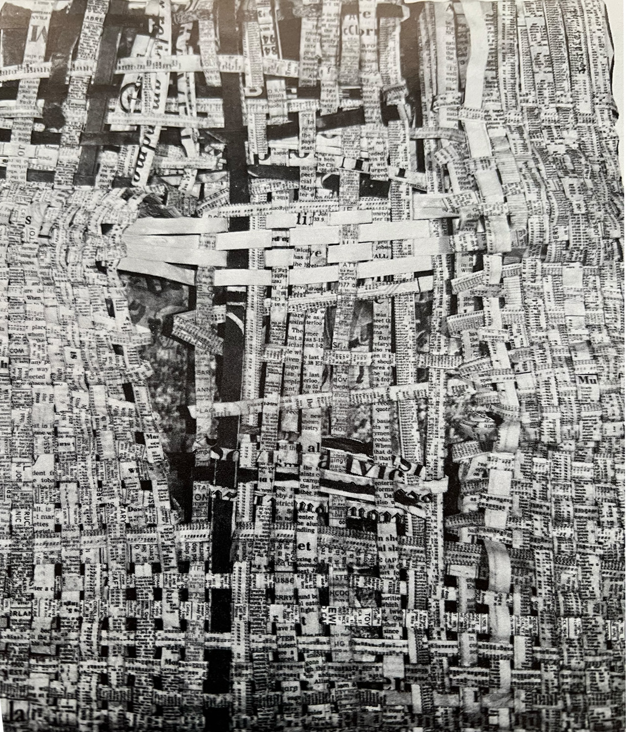 Abstract fiber weaving made from strips of newspaper.